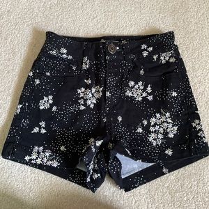 SO Black shorts with daisies.
